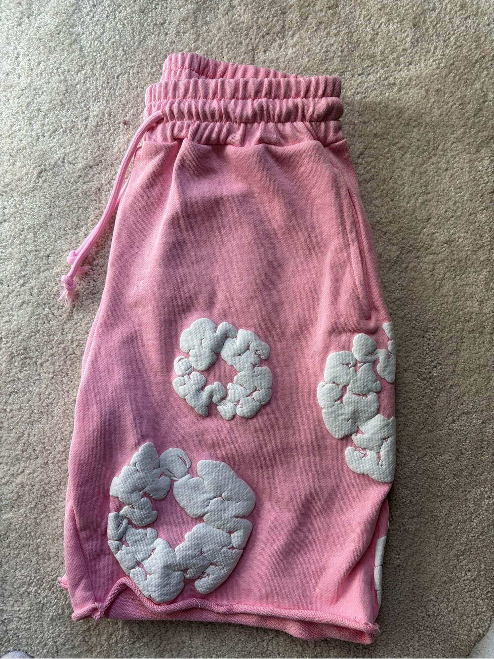 Pink denim tear shorts
